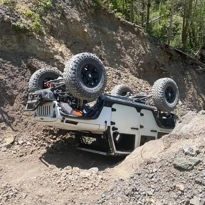 M&H Towing and Recovery with an up side down Jeep on the Trails of Colorado