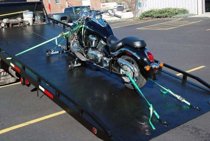 M&H Towing pickup a broke down motorcycle