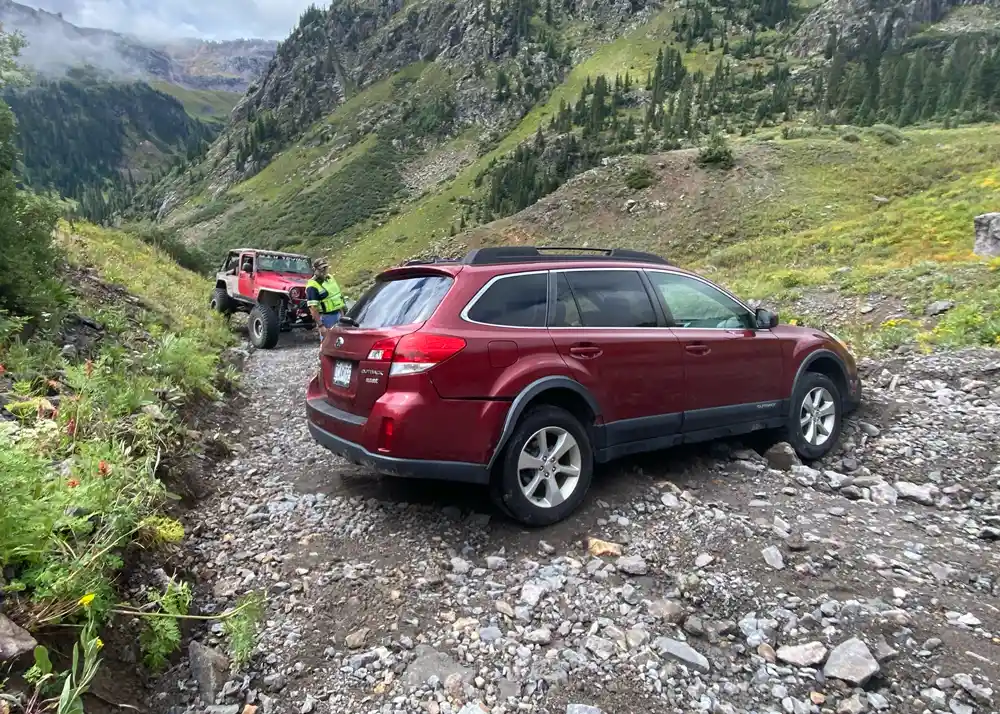Recovery of Subaru Outback from trail in the mountains of Colorado